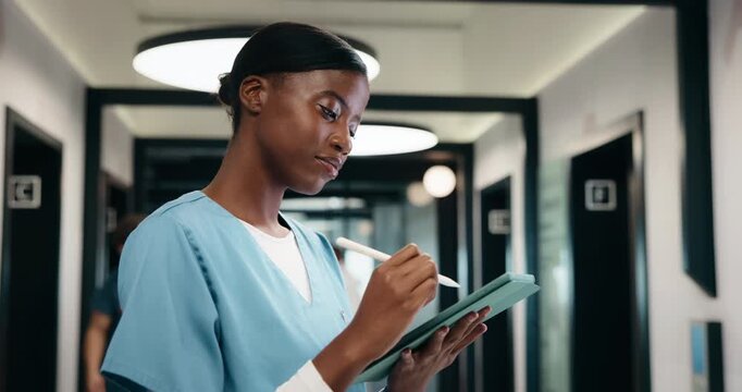 Nurse, pen or woman with tablet for healthcare history, records or admin information in hallway. Tech, person or medical worker with stylus at hospital for schedule update, scroll email or telehealth