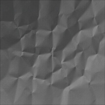 The crumpled surface of a gray material exhibits a complex pattern of folds and creases.