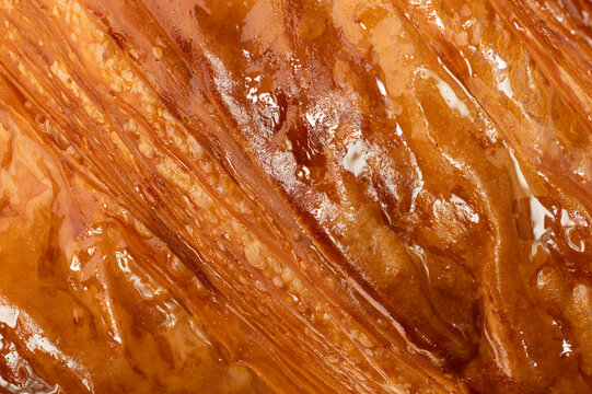Ultra sharp croissant texture macro baked pastry crust background