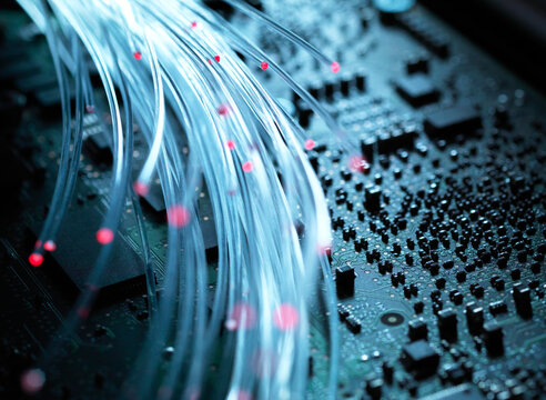 Fibre optics, hardware, circuit board in the background