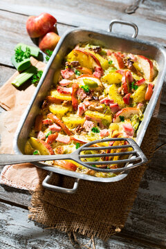 smoked pork chop casserole with potatoe, apple, leek and roasted walnut