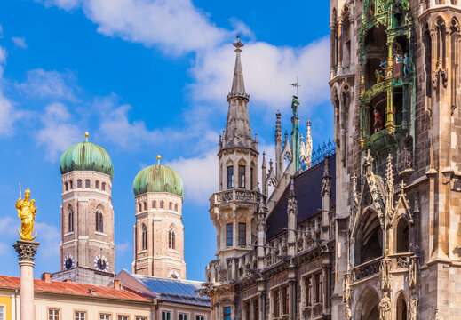 Germany, Munich, view of Marian column, spires of Cathedral of Our Lady and new city hall