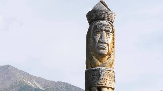 ARSHAN, Russia - August 28, 2024: A carved wooden totemic sculpture in one of the small Buryat villages.