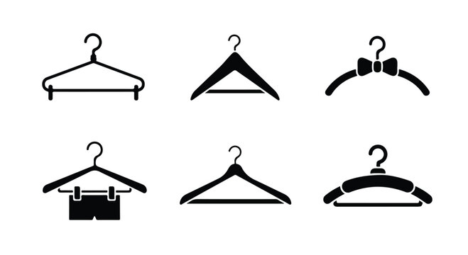 Collection of various clothing hangers including wooden, plastic, and wire hangers with different shapes and designs