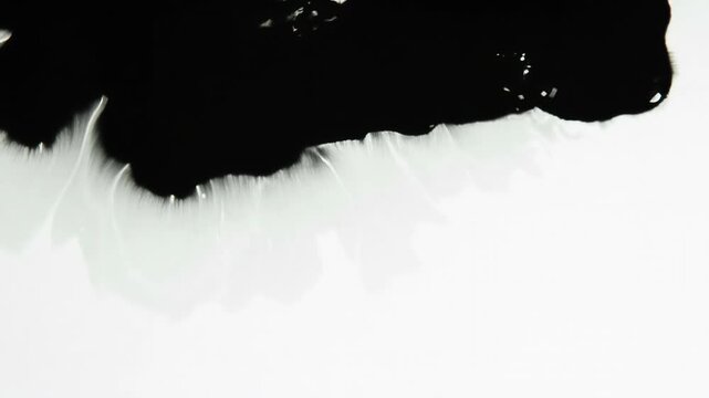 Influx of Black Ink. Streaks of black paint gradually closed white screen. Excellent for inter-frame transition