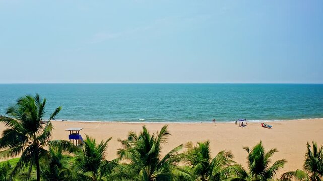 High aerial drone shot of Negombo beach revealing expansive ocean views, sandy shoreline and tropical Sri Lankan coastline scenery.