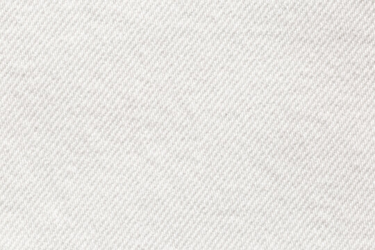Macro of white jeans denim fabric texture background