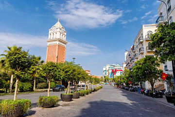 Obraz premium Phu Quoc, Vietnam - January 3 2026: Mediterranean clock tower square in Sunset Town Phu Quoc