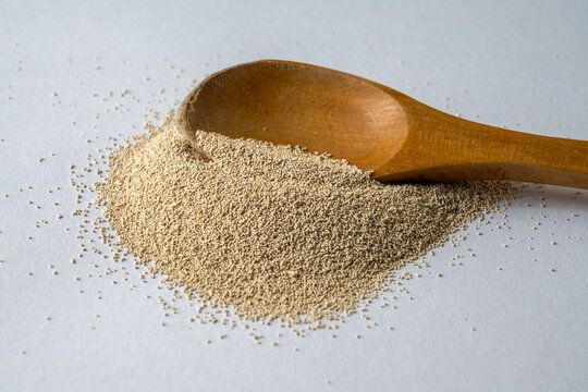 Dry Baking Yeast On Wooden Spoon