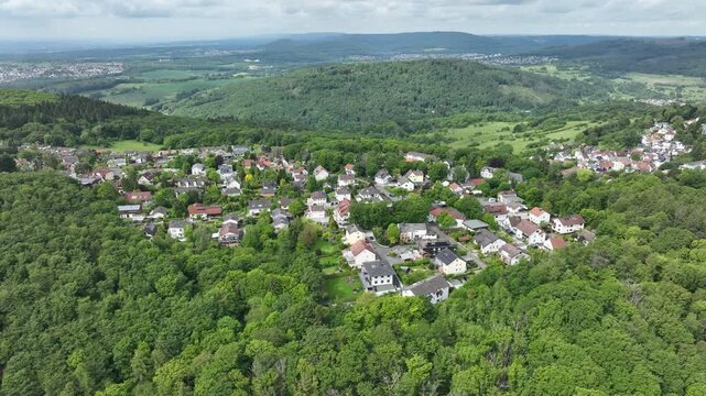 Cinematic drone footage showing Kelkheim-Eppenhain in the Taunus mountains of Hesse, Germany