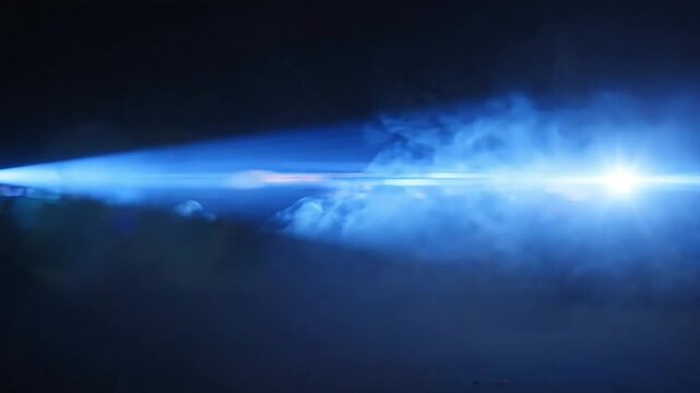 Bright blue light beam, shining spotlight, dramatic illumination, fog effect
