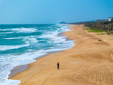 aerial view of waves on the beach