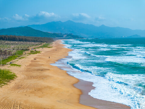 aerial view of waves on the beach
