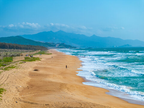 aerial view of waves on the beach