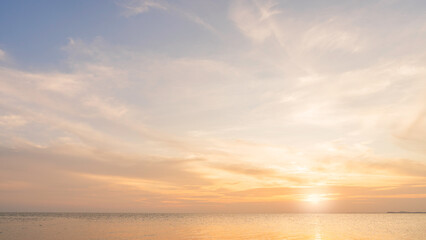Fototapeta premium Summer Evening,Dramatic blue,Yellow sunny morning sky sea sunlight,Horizon landscape nature warm sun dawn Orange Gold sunlight, Evening sky background