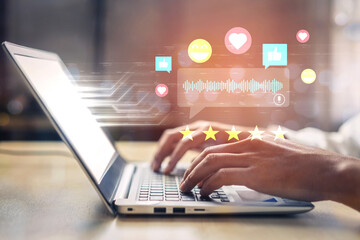 Obraz premium Person Using Laptop with Digital Communication Icons, Social Media Feedback and Engagement Symbols Concept for Online Interaction and Response Ledger.