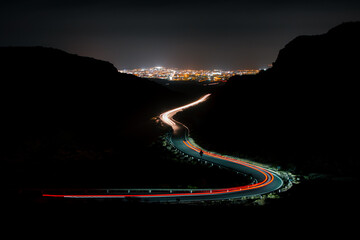 Long exposure night photography with stars and car lights © CL Productions