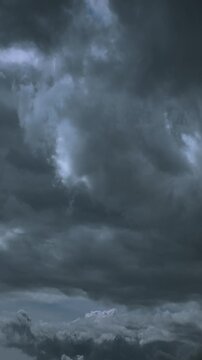Ominous dark grey storm clouds filling the horizon before rain