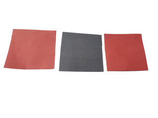 Obraz premium Three fabric squares in red and blue colors