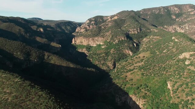 Garita canyon with deep canyon formations, rugged rocky cliffs, dense vegetation, and mountain ridges near Sierra P&eacute;njamo, Guanajuato, Mexico