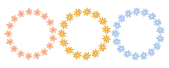 A set of floral wreaths with cute pink, yellow and blue flowers. Botanical circle frames isolated on white background. Perfect for wedding invitation, logo, greeting card, and decorative design. © lesyau_art