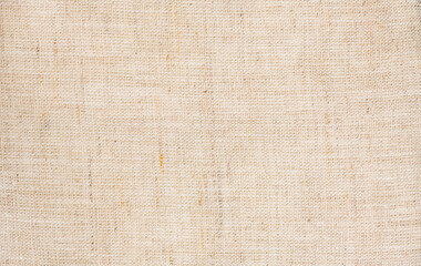Fototapeta premium Natural linen fabric texture background, linen canvas backdrop, natural eco linen background. Bio textile material backdrop, canvas top view, close up 