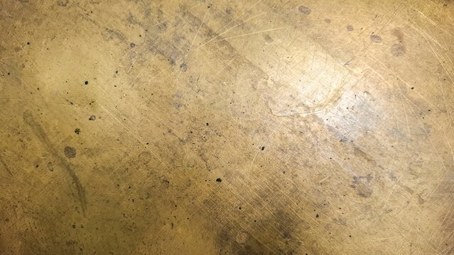 Scratched vintage metal texture with worn industrial surface
