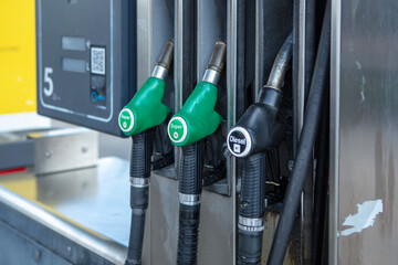 Fuel pump at the gas station, close-up of fuel nozzle  © Andreas