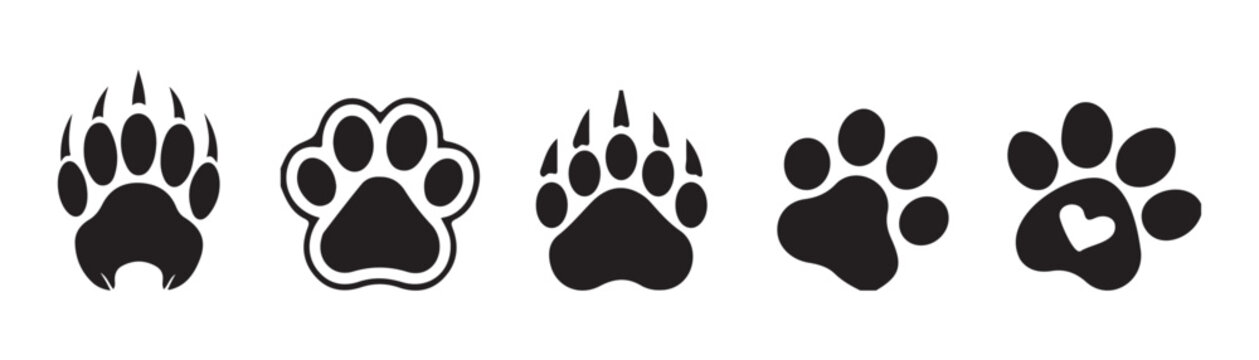 Set of animal paw prints and footprint icons including bear tracks and heart shapes for graphics.