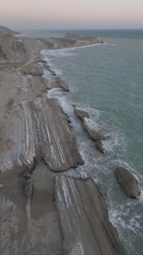 Ocean sea harbour rock in Iran Persian Gulf landscape Arabian marine shore coastal cliff headland environment erosion beach formation debris tropical Qatar energy coastline skyline wave wide panora