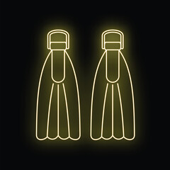 Pair of yellow neon swimming flippers on a dark background © anatolir