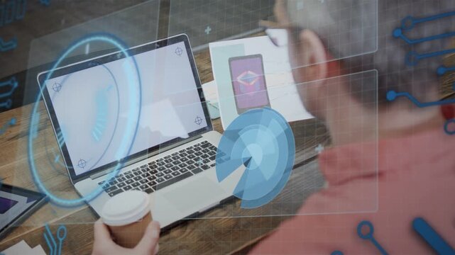 Man holding coffee, steadying mockup on laptop, initiating HUD rotating and pulsing for UX review