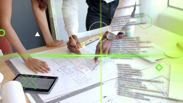 Two designers placing finger on blueprint marking plan and confirming design as neon overlays sweep