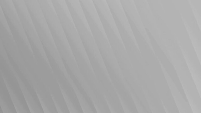 Abstract geometric seamless loop background with soft white and gray diagonal 3D lines moving smoothly. Perfect for corporate presentation, elegant intro, or modern tech backdrop.