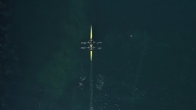 Rowing Sport Over Deep Blue Water - Aerial Drone Shot