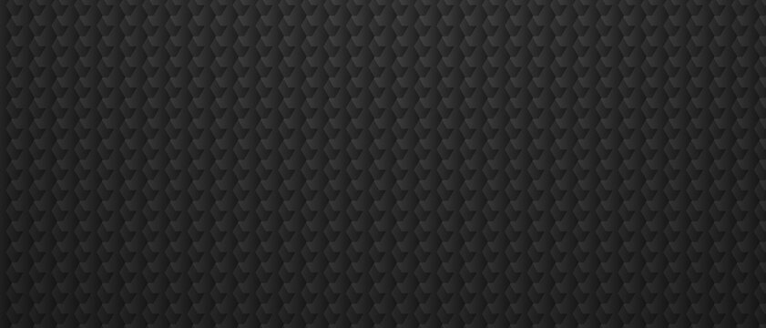Repeating scale pattern background dark carbon texture surface.