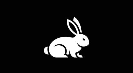 Obraz premium A minimalist white rabbit silhouette is depicted against a stark black background, showcasing a simple yet elegant design.