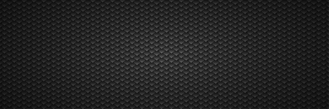 Dark scaled pattern background textured black reptile like surface.