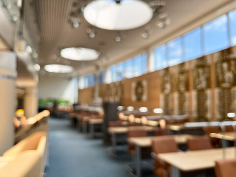 Blurred interior of a modern library or study space background