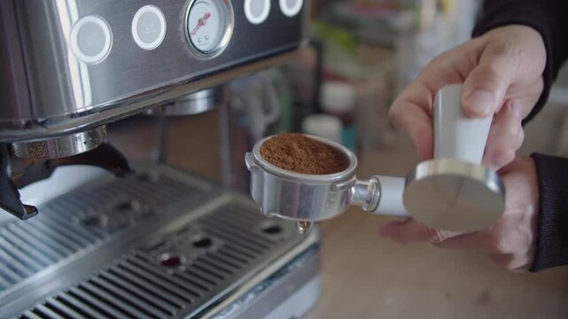 Leveling Coffee Grounds in Portafilter with Tamper