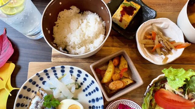  Top view of a traditional Japanese breakfast set with rice and various side dishes