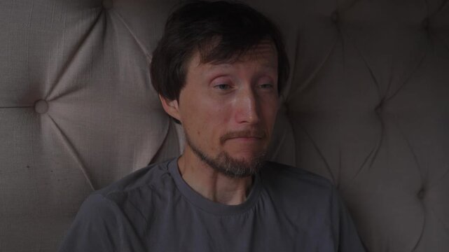 Middle aged man sneezing. High quality audio recording. Realistic capture of sudden body reflex and respiratory reaction. Health awareness, hygiene and everyday lifestyle concept.