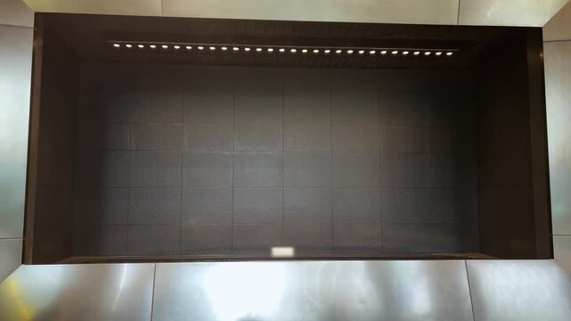 Digital water clock prints time and intricate patterns at Osaka Station. Precision water droplets fall in sync to display mesmerizing numbers and cultural symbols at South Gate Building.