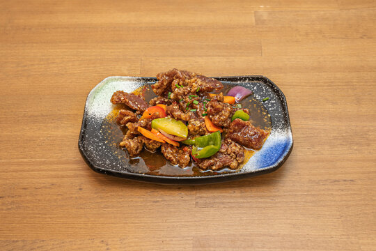 A tray full of delicious Chinese beef stew recipe with vegetables and sauce.