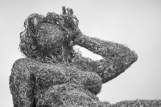 Intricate wire human sculpture