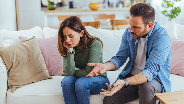 Couple Arguing in Living Room Showing Tension, Relationship Conflict and Emotional Distress