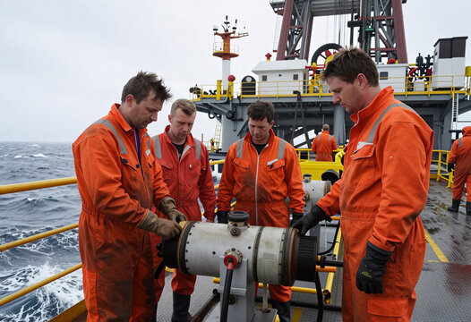 Offshore Oil Platform Workers in Stormy Weather
