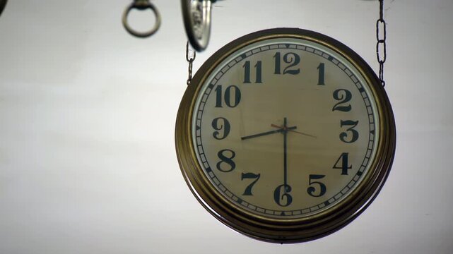 Close Up of Vintage Railway Station Clock Hanging from Chains with Ticking Second Hand - 4K