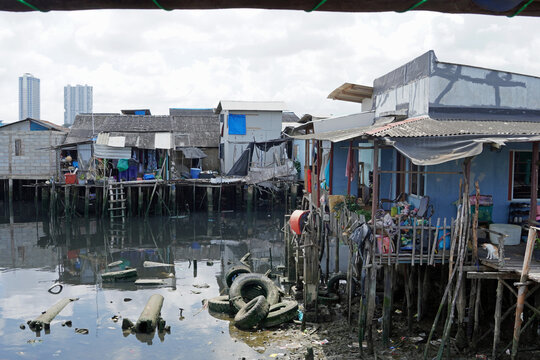 stilt house over calm water in batam