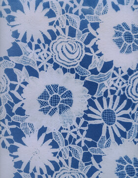 Cyanotype on watercolor paper of floral lace fabric